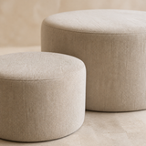 Close-up of Matera round ottoman set fine woven upholstery