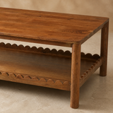 Close-up of Matera Solid Wood Coffee Table grain and scalloped shelf detail