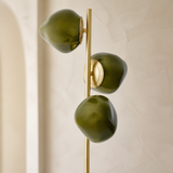 Stella Floor Lamp — olive glass and brass detail