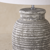 Close-up of Addie Ceramic Lamp distressed ribbed ceramic finish and silver fitting
