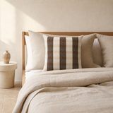 Addie Soft Cushion styled on a neutral European minimalist bed