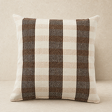 Addie Soft Cushion on warm beige wall and floor studio background
