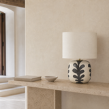 Aleah Ceramic Lamp styled in a warm Mediterranean minimalist entryway