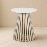 Amalfi marble and pale oak side table on a warm beige studio background