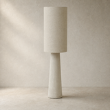 Amour Ceramic Lamp Ivory on warm beige plaster and limestone background
