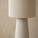 Close-up of Amour Lamp natural linen shade and matte ivory ceramic finish