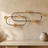 Angelo sculptural wall piece in a premium Mediterranean entryway