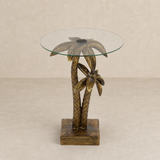 Antigua sculptural palm side table in a warm beige studio