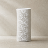 Arco Porcelain Table Lamp White on warm beige plaster and limestone background