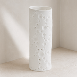 Ari white porcelain lamp three-quarter view showing the wavy rim