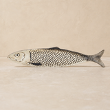 Arli decorative ceramic fish in a warm beige studio