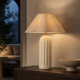 Aspen Resin Lamp Ivory illuminated in an evening interior