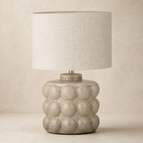 Aspen Resin Lamp Ivory Small on a warm beige studio background