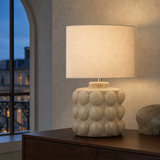 Aspen Resin Lamp Ivory Small illuminated in an evening interior