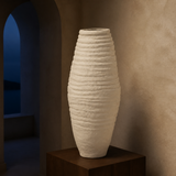 Aspen Resin Table Lamp 25x40 sculptural resin vessel in an evening gallery interior