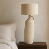 Aspen Resin Table Lamp from an alternate angle in a minimalist bedroom