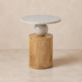 Assisi Marble & Timber Side Table in a warm beige studio