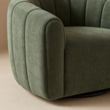 Close-up of Aurelia Swivel Chair chenille upholstery, channelled arm and thin swivel base