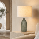 Bali Rattan Lamp with sage green mottled base in a premium Mediterranean interior