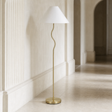 Becker Metal Floor Lamp from an alternate angle in a European gallery hallway