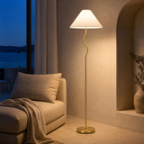 Becker Metal Floor Lamp illuminated in a Mediterranean interior at blue hour