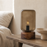 Belize lamp from an alternate angle on a wooden bedside table