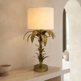 Bermuda antique brass palm table lamp in a premium Mediterranean interior