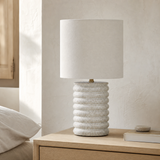 Bern Blue ceramic table lamp from an alternate angle in a minimalist bedroom