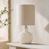 Bern Green ceramic table lamp in a premium Mediterranean limestone interior