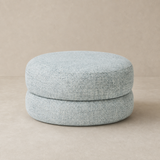 Bianca Round Boucle Ottoman on a warm beige Elara studio background