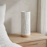 Bolla Porcelain and Wood Lamp in a serene European bedroom