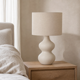 Bondi Rattan Lamp in a serene European bedroom