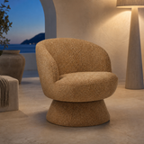Bressanone camel upholstered chair in Mediterranean blue-hour lounge