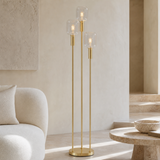 Bruno metal and glass floor lamp in a premium Mediterranean living room