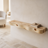 Burley natural timber live-edge floating display in a European study