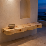 Burley pale timber live-edge piece in a Mediterranean interior at blue hour