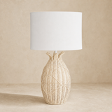 Cali rattan lamp with white shade in a warm beige studio