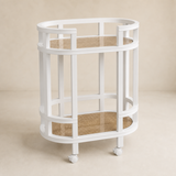 Capri Rattan and Timber Bar Cart on a warm beige studio background