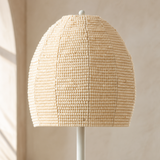 Close-up of the Carter lamp cream beaded shade and ivory finial