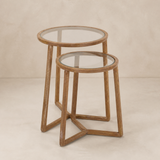 Castello oak and glass nesting tables in a warm beige Elara studio