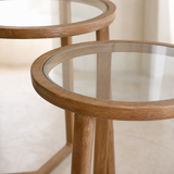 Close-up of Castello nesting tables natural oak grain and inset glass