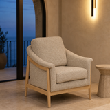 Catania Velvet Accent Chair in a European coastal interior at blue hour