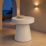 Chiana shell mosaic table in a Mediterranean interior at blue hour