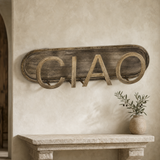 Ciao metal wall artwork in a premium Mediterranean entry interior
