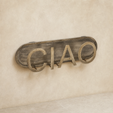 Ciao metal wall artwork in a warm beige Elara studio