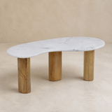 Como marble and timber table in a warm beige Elara studio