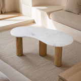 Como marble and timber table in a European minimalist lounge