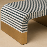 Close-up of Cordoba striped inlay waterfall corner and antique gold base