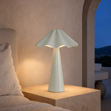 Dawson ceramic lamp illuminated in a Mediterranean bedroom at blue hour