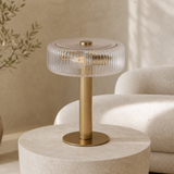 Deluca gold metal and ribbed glass lamp in a premium Mediterranean living room